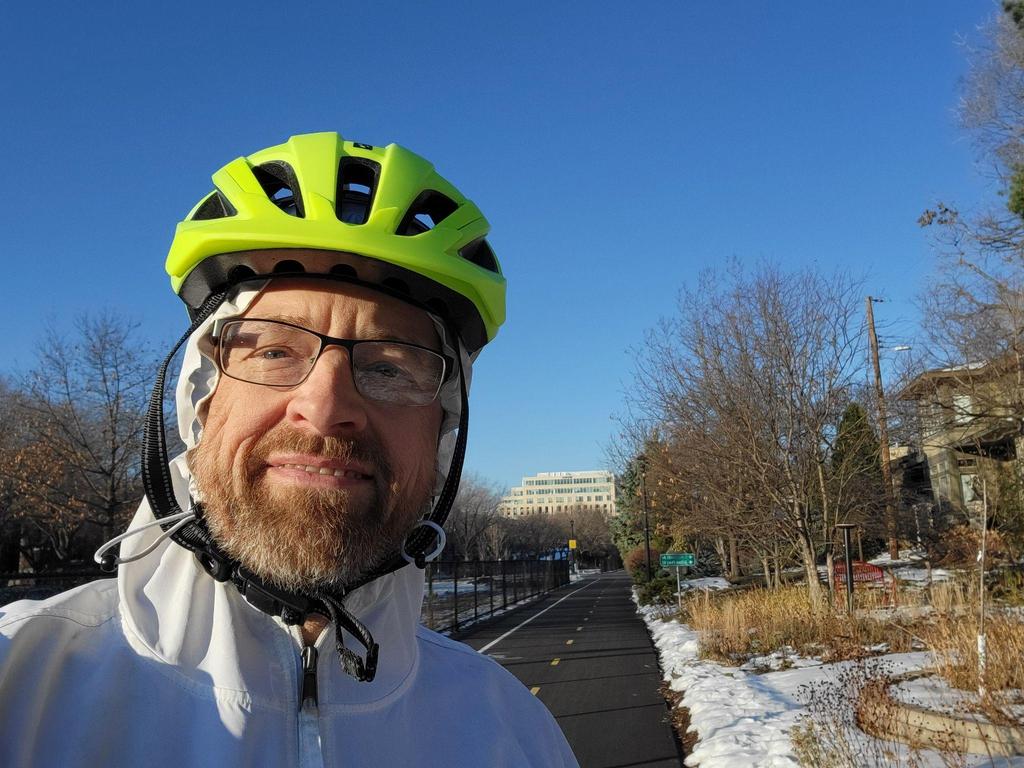 Keith Heiberg pauses from his bicycle ride for a selfie on the Midtown Greenway in Minneapolis