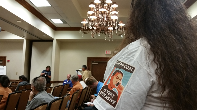 Native American activist in Sierra Club "Cheap Coal is Very Expensive" t-shirt