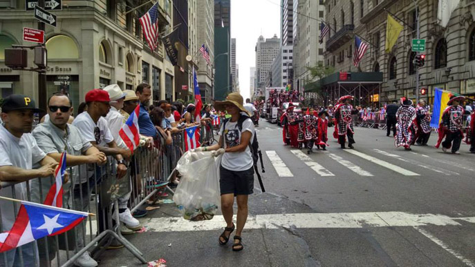 Collecting recycling at 2015 National Puerto Riban Day Parade