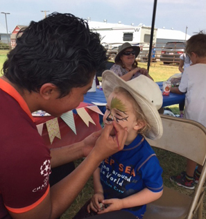 Face-painting at the 2018 Montana Clean Energy Fair in Bozeman