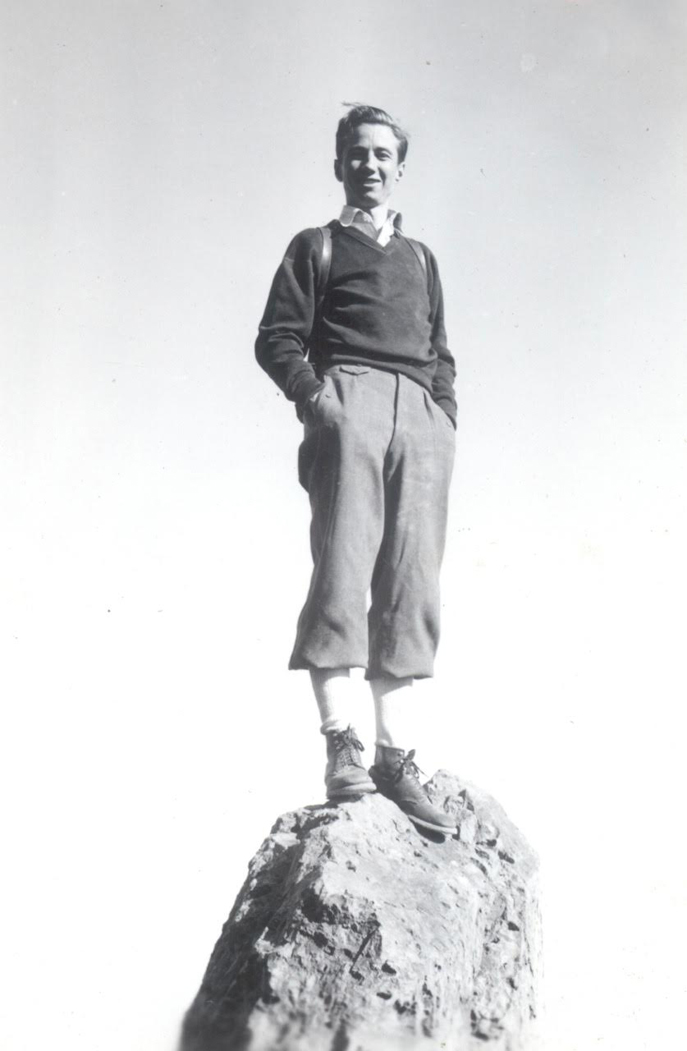 Glen Dawson on the summit pinnacle of Fountain Peak, Providence Mountains, California, November 1938