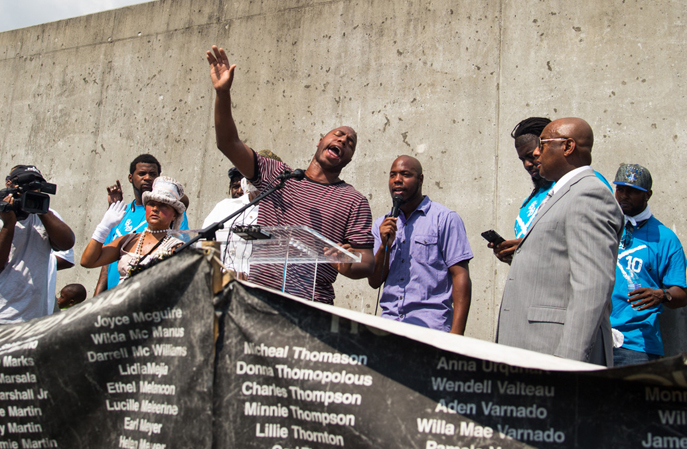 Healing ceremony and reading of names at Industrial Canal levee in Lower 9th Ward.