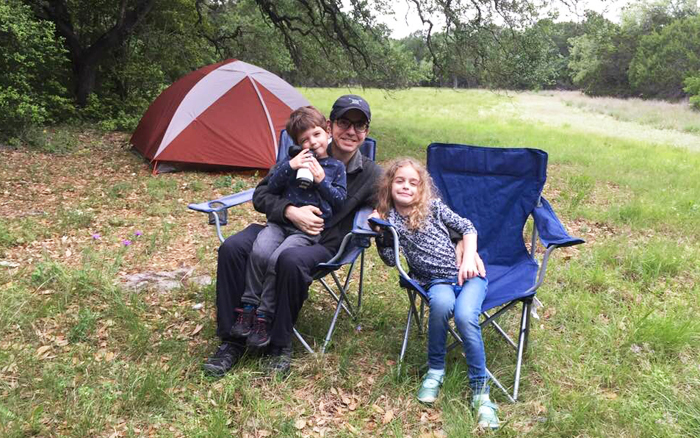 Oliver Bernstein camping with his kids in TX