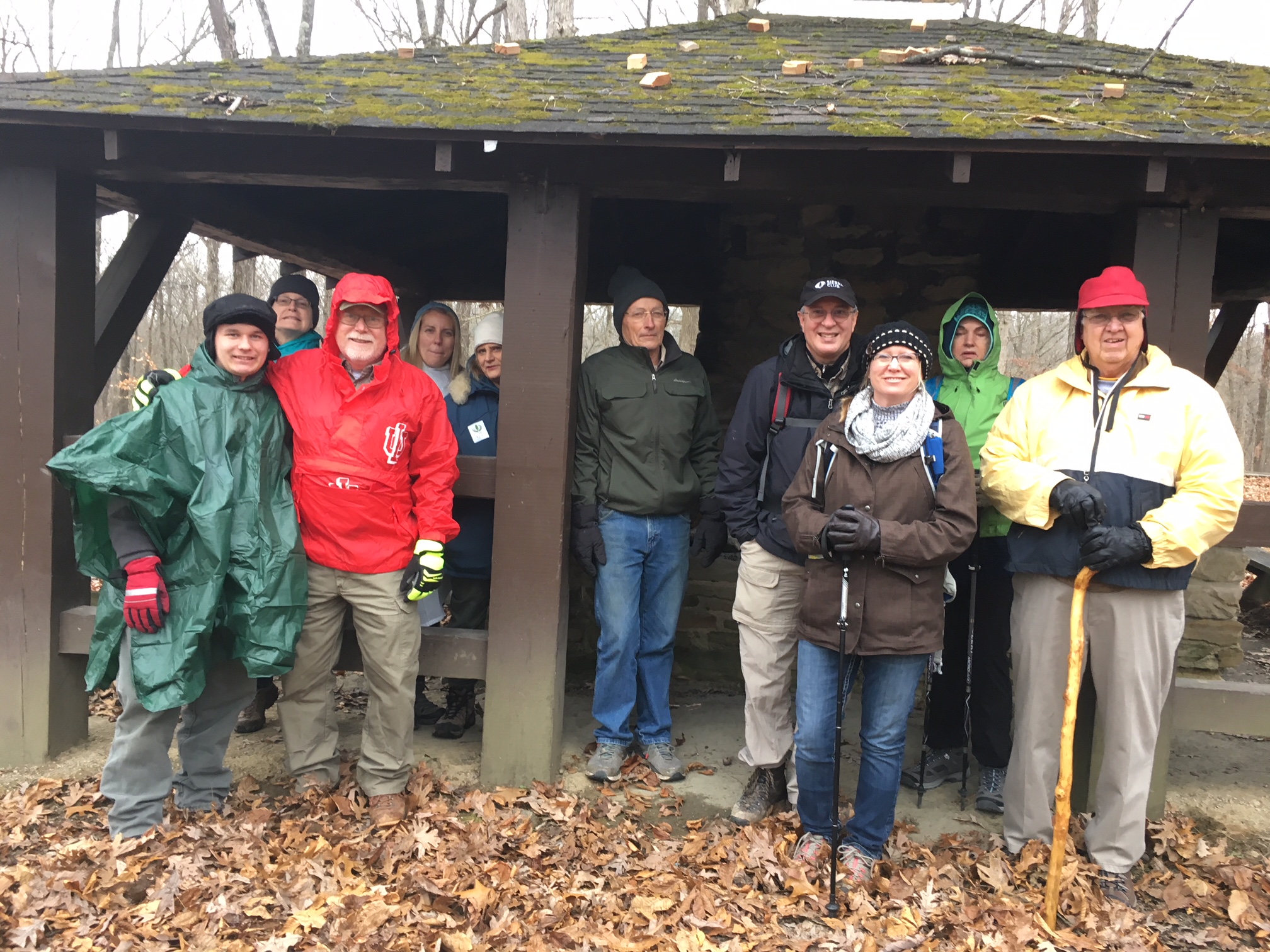 Participants on Winding Waters hike stood in shelter