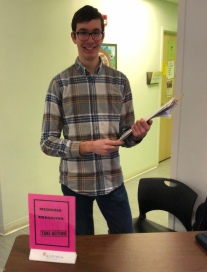 Adam Hemauer collects signatures for Medicaid expansion