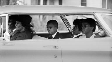 Black family in a car