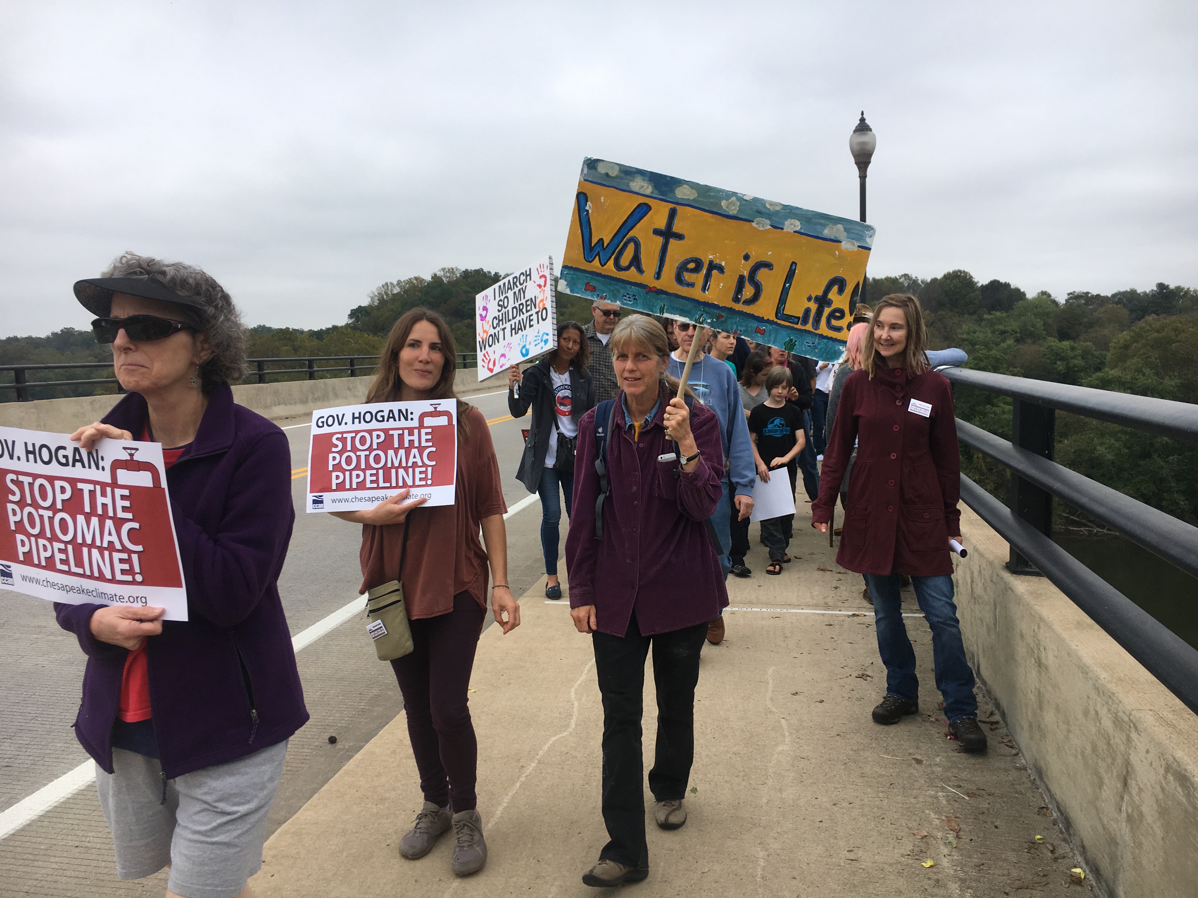 people marching against pipeline under Potomac