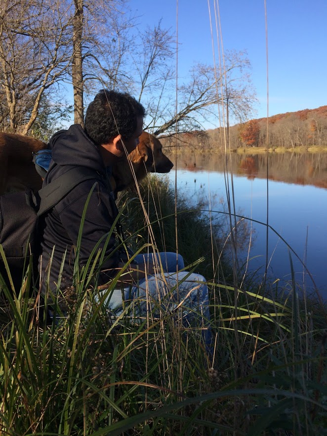 Man & dog admiring Minnesota water