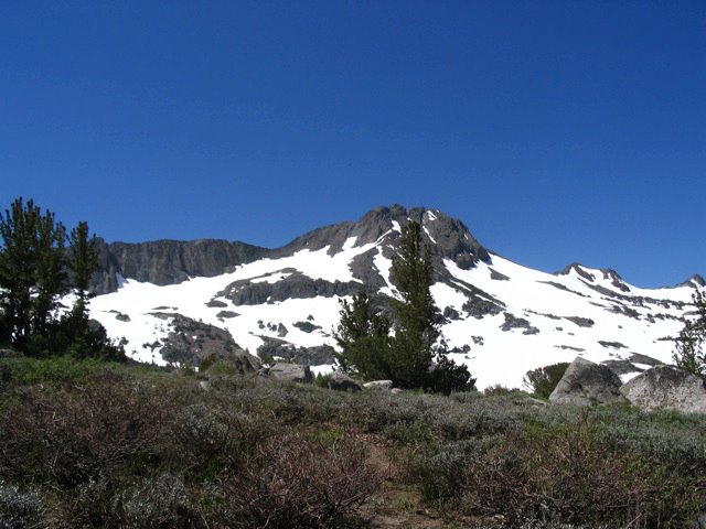 Sierra Nevada peakwith some snow in summer with deep blue sky