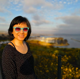 Image of Hoiyin Ip wearing sunglasses and smiling
