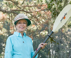 Image of Janet Stanko holding a paddle