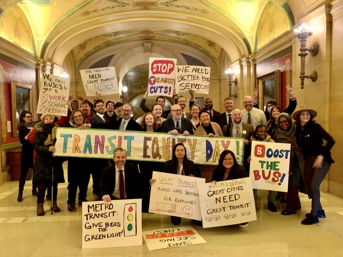 Testifiers, transit and climate experts, union bus drivers, Transportation Forward coalition partners, and Minnesota House members gather outside a State Capitol hearing room for Transit Equity Day. Photo: Move Minnesota