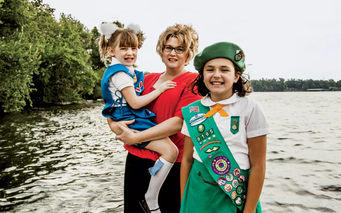 Jenica Hopkins (shown with her daughters, Alivia and Ameilia) co-leads a pollution-fighting Girl Scout troop.