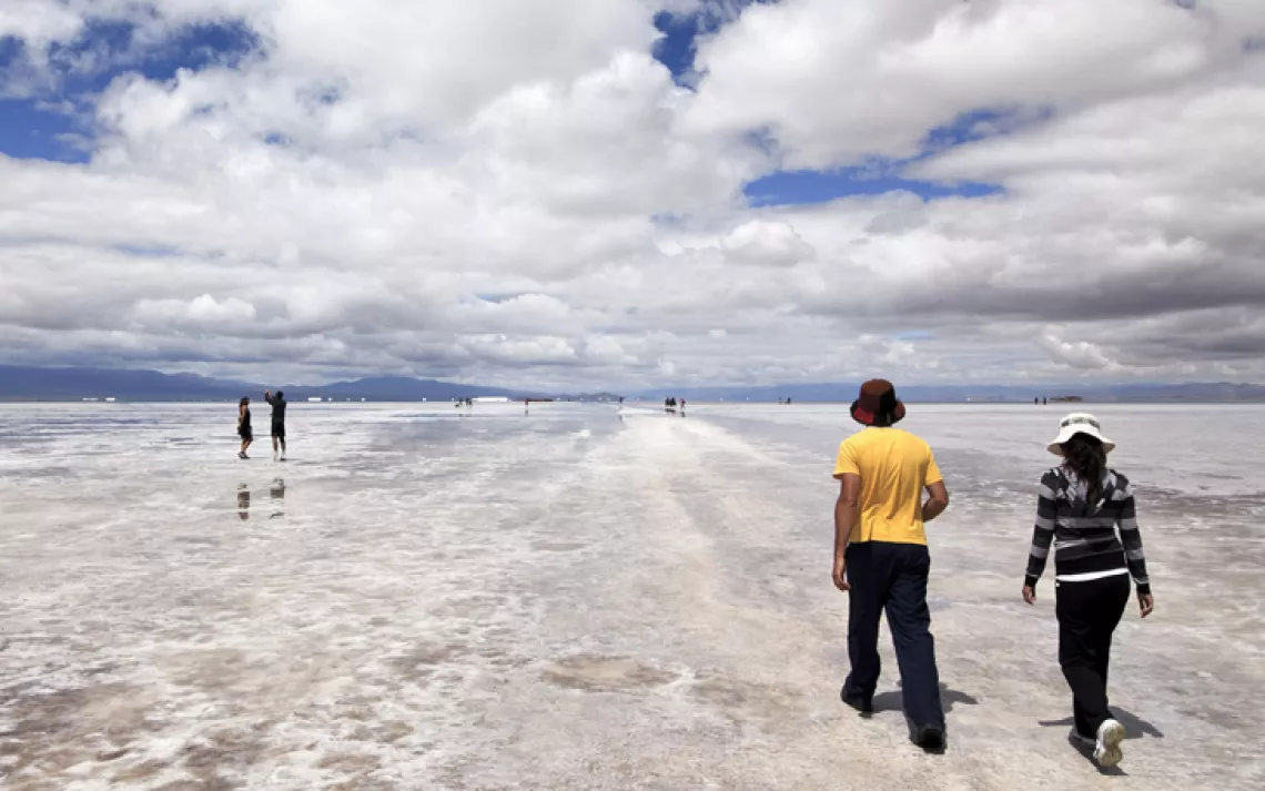 Vast sky meets the cracked, crusty expanse of Argentina's Salinas Grandes.