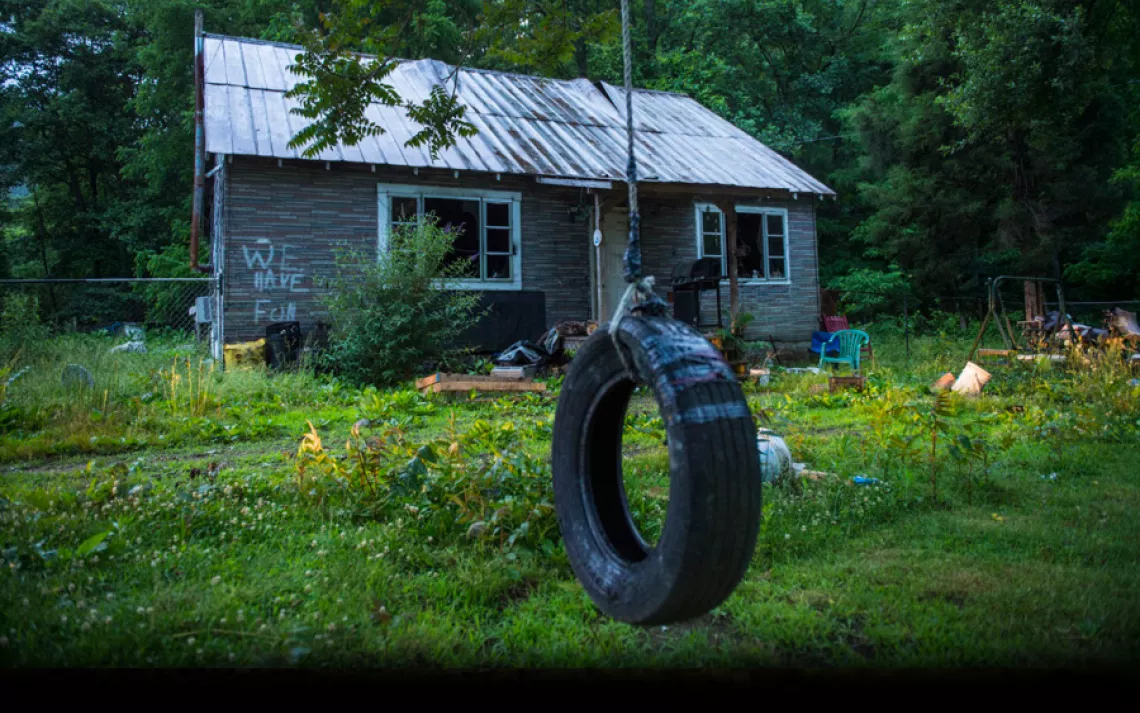 An abandoned home in Bandytown, West Virginia. | Ami Vitale/Panos Pictures