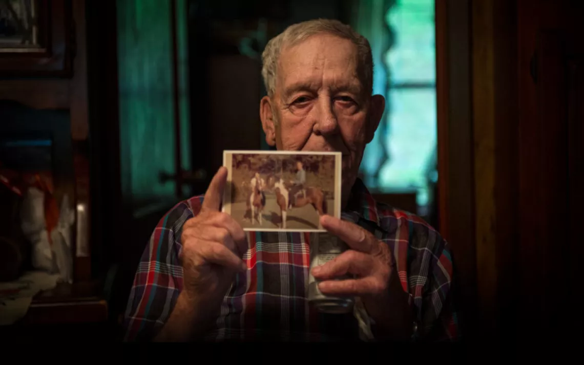 Hershel Aleshire of Blair, West Virginia: "Back when I was a kid, we made our own fun. We fished and we played ball and rode horses. We run after girls. Some of it I ain't gonna tell ya. Turn the camera off, I still ain't gonna tell ya." | Ami Vitale/Pano