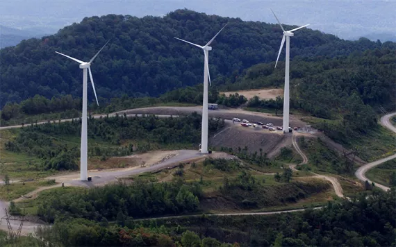 Three windmill turbines sit atop Buffalo Mountain in Oliver Springs, Tenn