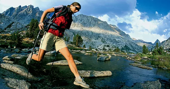 With a light pack and nimble feet, Janine Patitucci goes rock hopping in Evolution Basin on the John Muir Trail.