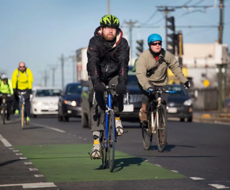 Bicycle riders in a bike lane 