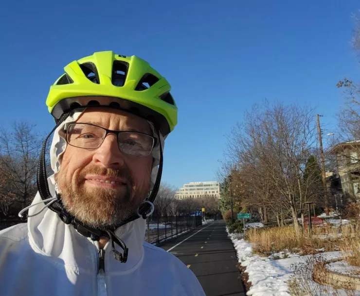 Keith Heiberg pauses from his bicycle ride for a selfie on the Midtown Greenway in Minneapolis