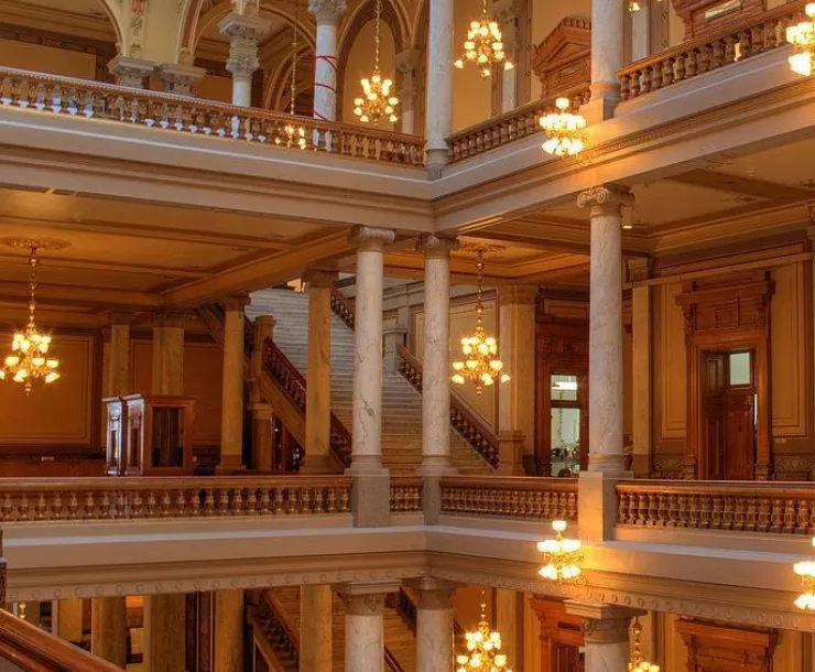 An interior shot of the Indiana statehouse halls, showing tall columns