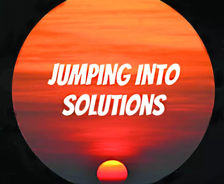 Jumping into Solutions logo written across a sunset.