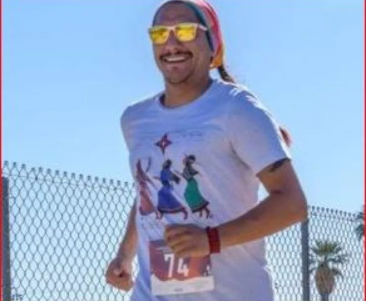 Sergio Running Smiling.JPG