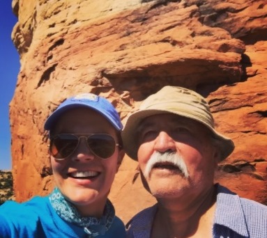 Lena Moffitt with Willie Grayeyes, Chairman of the Board of Utah Dine Bikeyah in front of Walnut Knob in the Bears Ears National Monument.