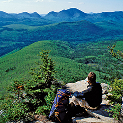  A backpacker rests above White Mountains National Forest on the Appalachian Trail.