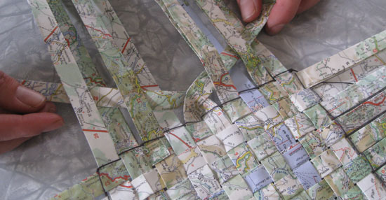 Maps Into a Paper basket
