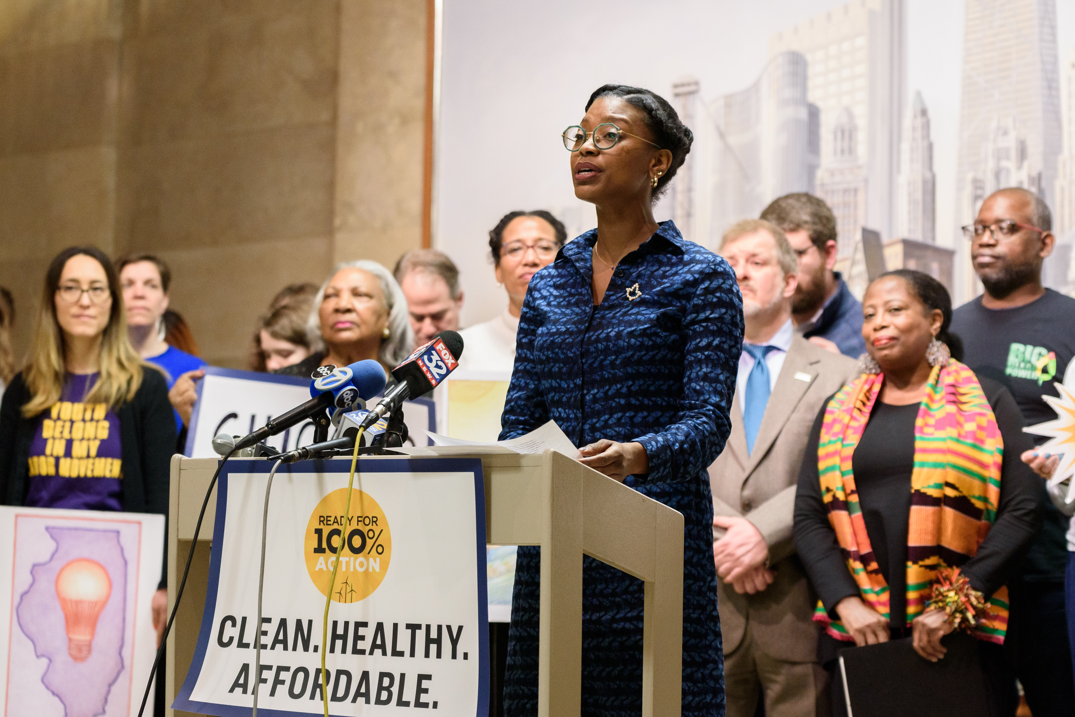 Kyra Woods, Ready for 100 organizer in Chicago, speaks at a press conference on April 10.