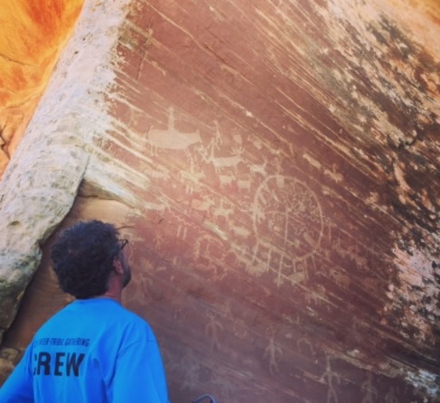 Dan Ritzman with the Sierra Club, views the pictographs on Walnut Knob in Bears Ears National Monument. 