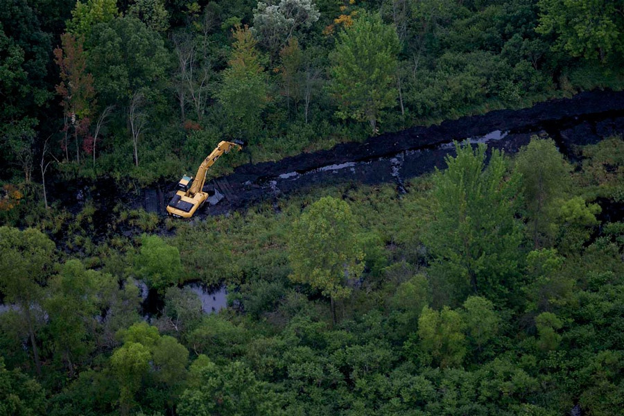 The overfilled Talmadge Creek, tributary to the Kalamazoo River, had to be totally dredged. After removing material from a two-mile stretch, engineers reconstructed the creek by referring to satellite images. Photo courtesy of the U.S. Environmental Protection Agency