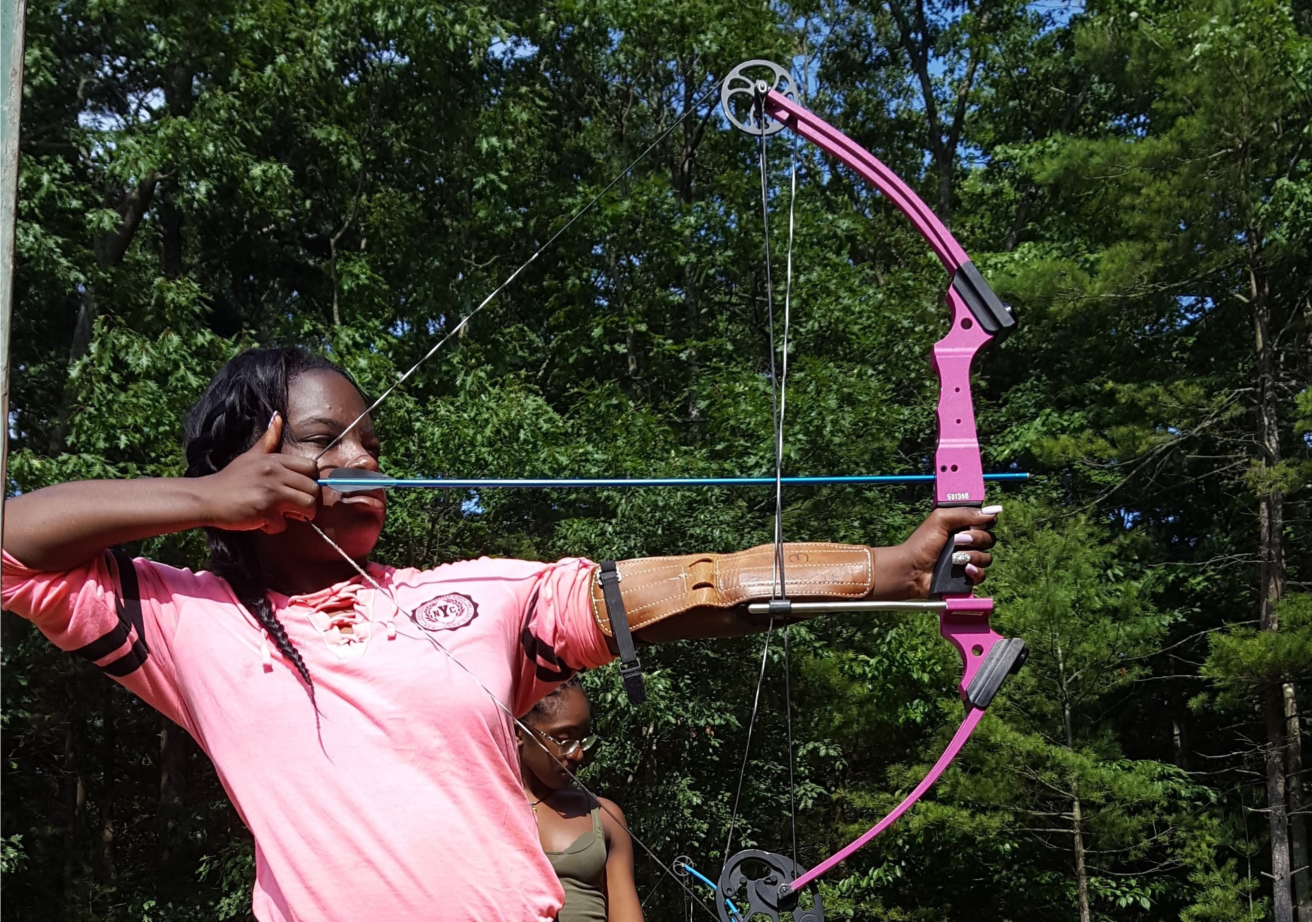 Gabrielle Struthers joins other Detroit ICO participants in an archery competition.