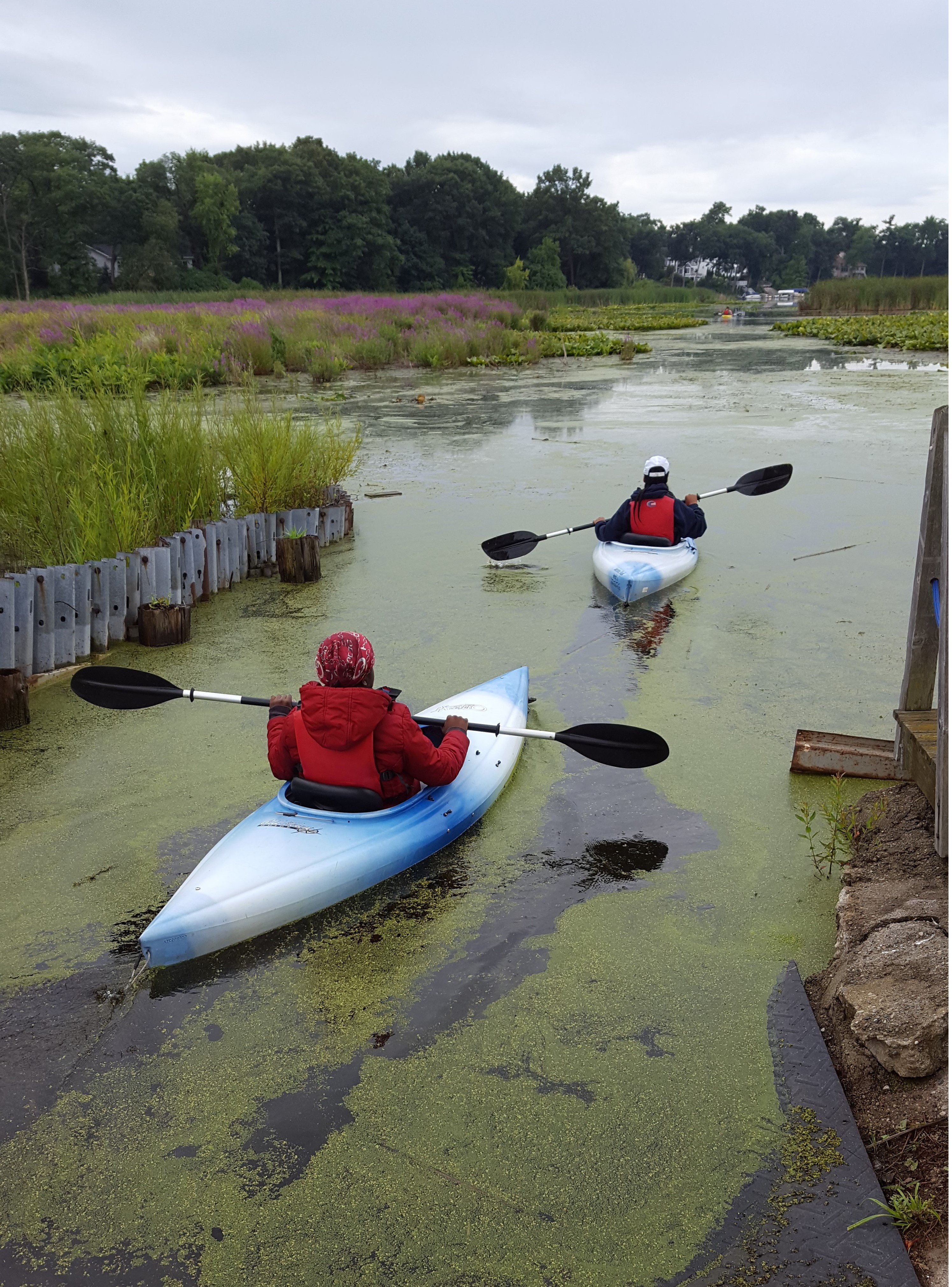Two Detroit ICO participants lead their group on a kayaking trip.