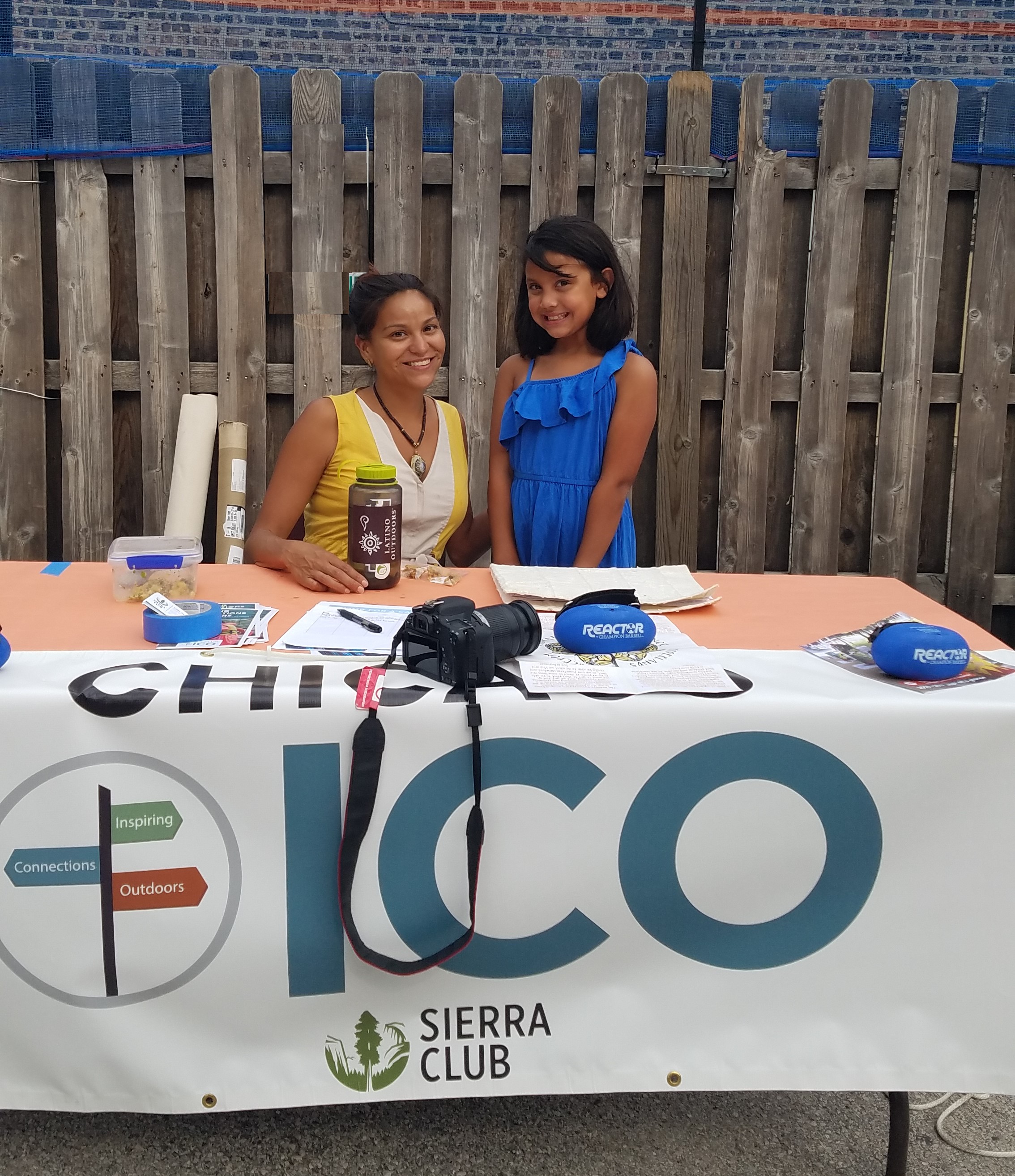 Katty Regalado and an ICO participant smile while promoting Chicago ICO.