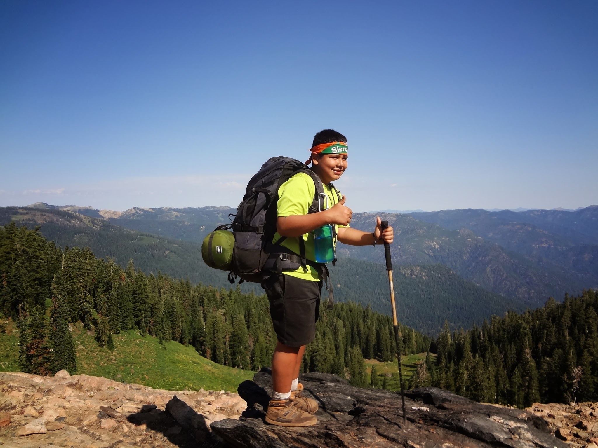 Leo Hernandez pauses on his hike to give the camera a thumbs up. 
