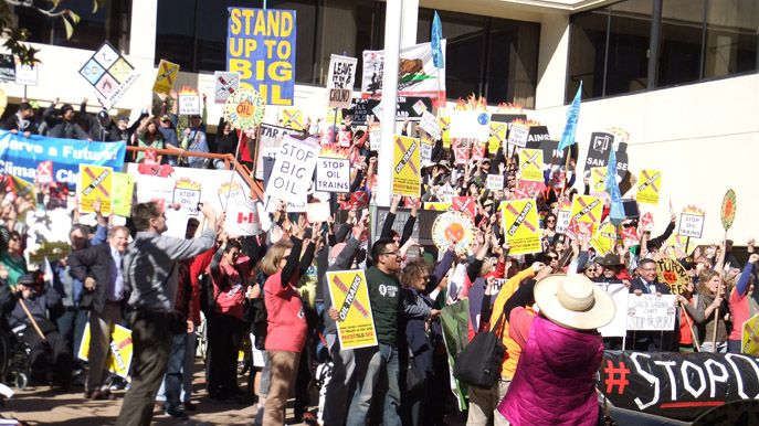 Activists protest a proposed tar sands oil terminal outside the San Luis Obispo County courthouse