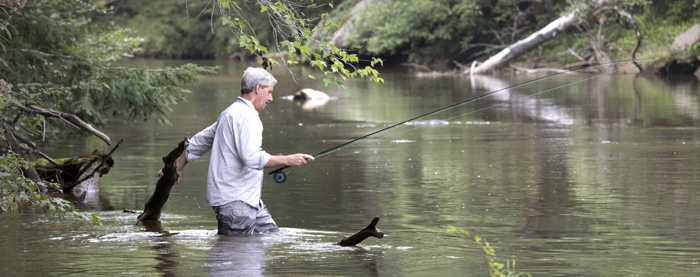 Mark Johnston fishing at Camp McDowell