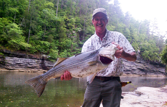 Mark Johnston fishing at Camp McDowell