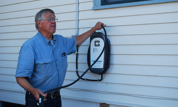 Reed Burkholder with Sierra Club EV charger