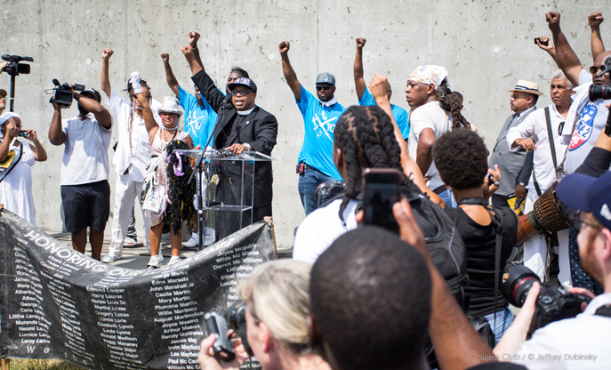 Reverend Lennox Yearwood at healing ceremony at Industrial Canal levee in Lower 9th Ward.