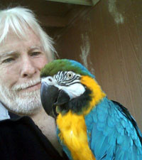 Michael Cox with rescued parrot