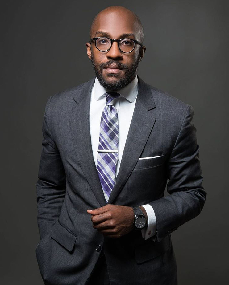 photo of Jerome Dees, a man wearing glasses in a suit.