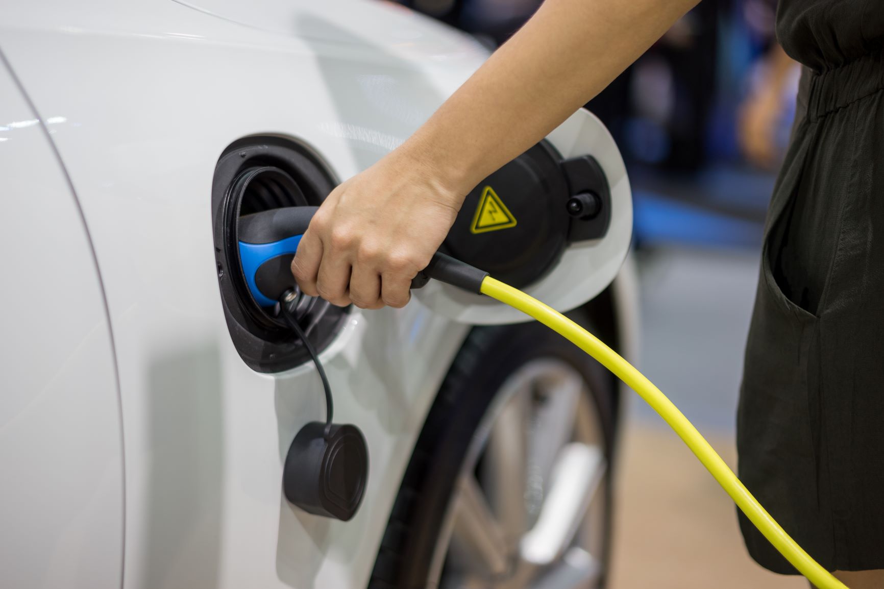 Electric vehicle being charged