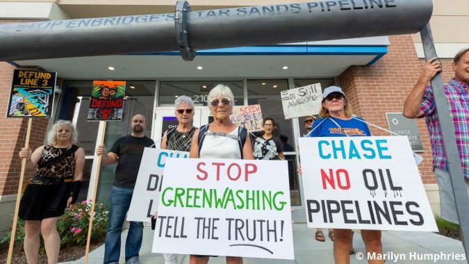 Protestors protesting outside of CHase bank