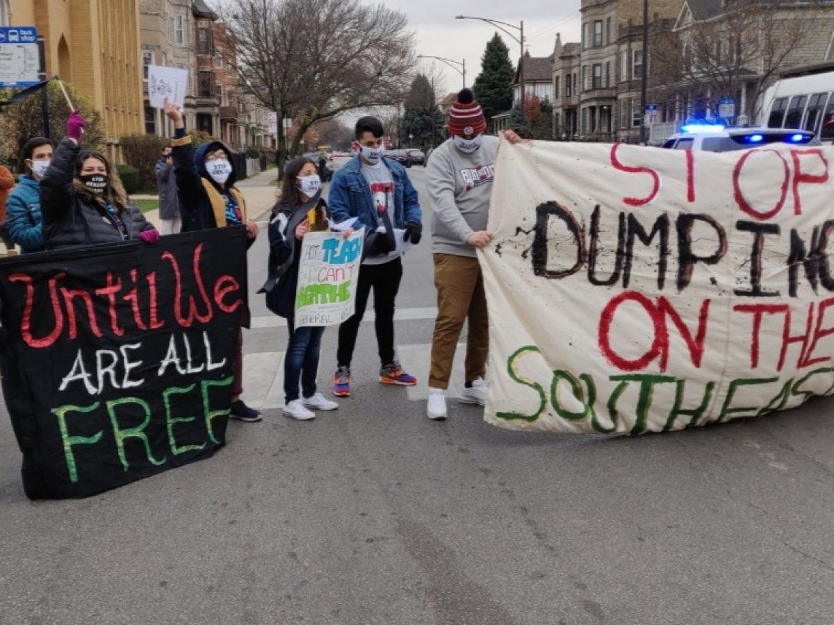 Protestors on the Southeast side hold signs fighting environmental justice