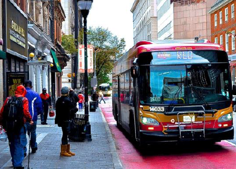 photo of bus picking up passengers