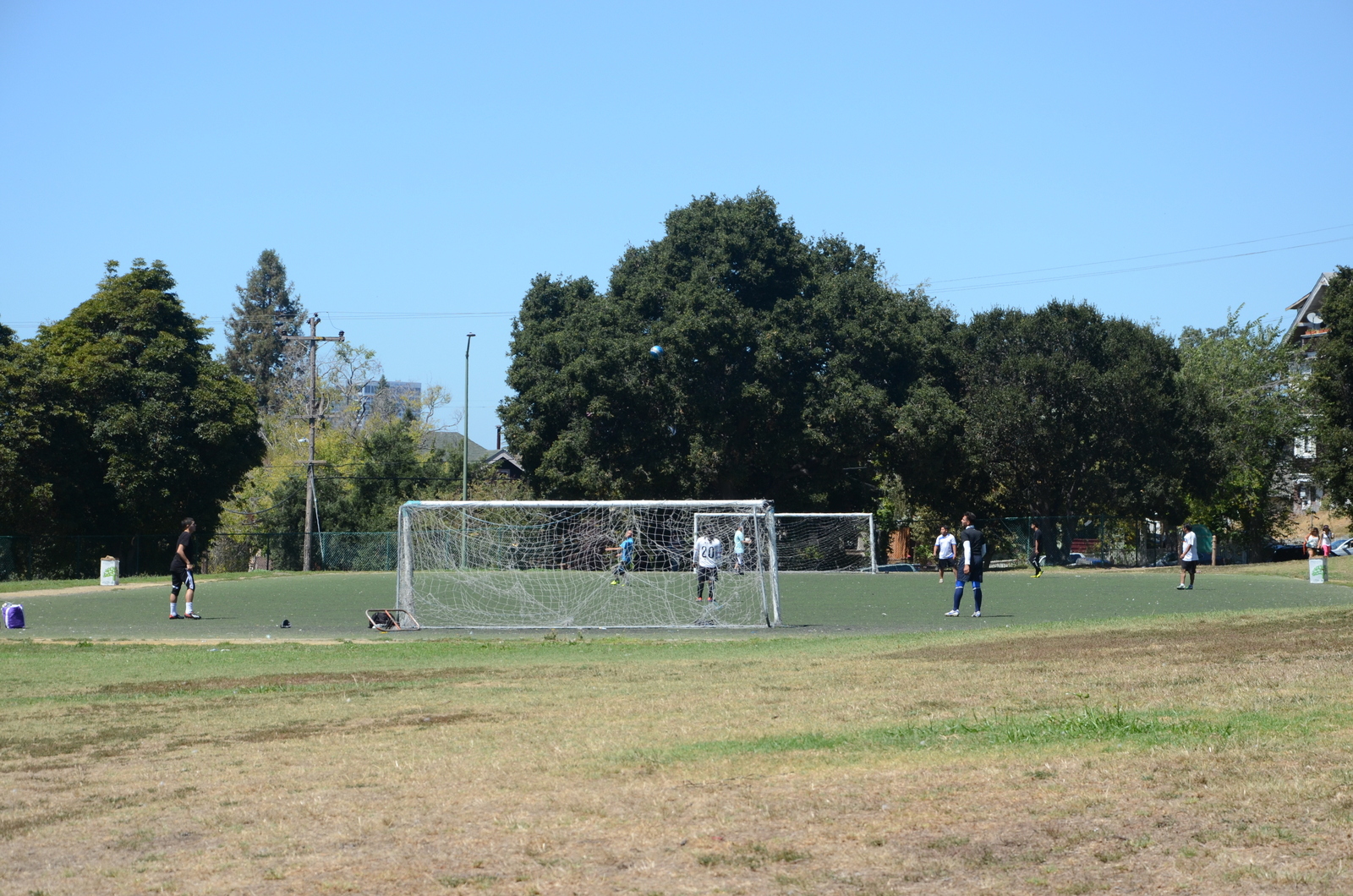 People playing soccer at San Antonio Park.
