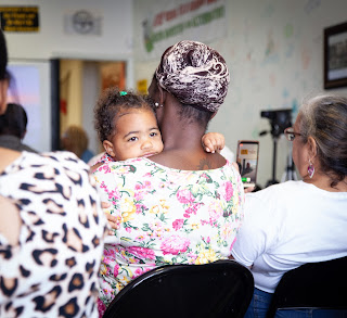 Mom and baby in audience